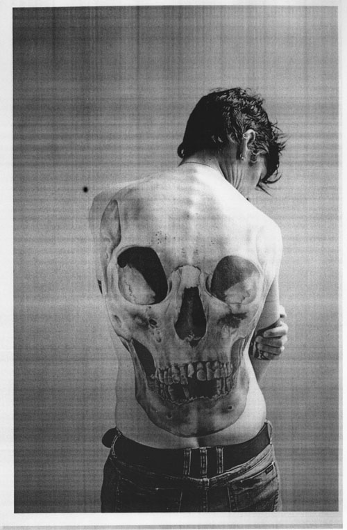 Skull Tattoo Back. the macarabre skull tattoo